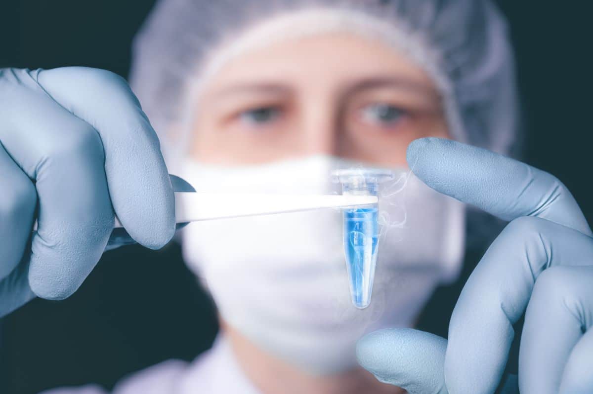 Researcher Holding Temperature-Sensitive Biological Materia